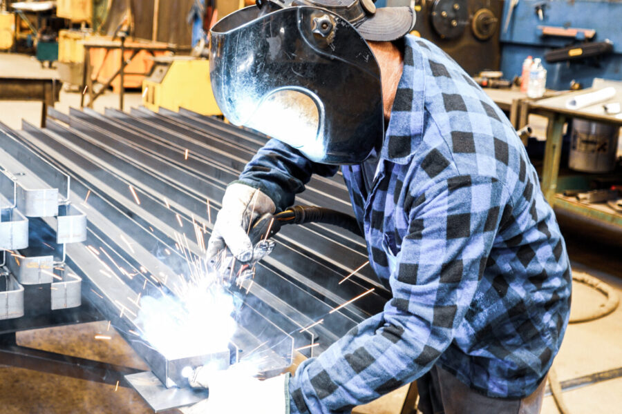 The Challenge: Producing More With Less Workers 