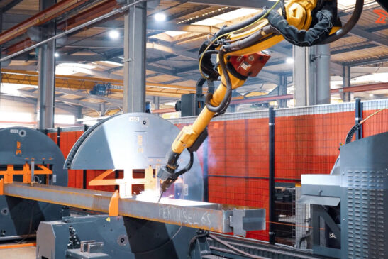 Robot Welding a Beam